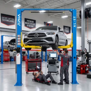 Cầu nâng ô tô 2 trụ Alpha AL-5T đang nâng xe Mercedes trong gara chuyên nghiệp.