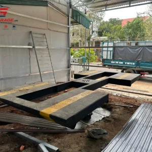 Thi công lắp đặt cầu nâng 1 trụ AIRTEK-CB tại xưởng, chuẩn bị khoan móng và dựng cột.