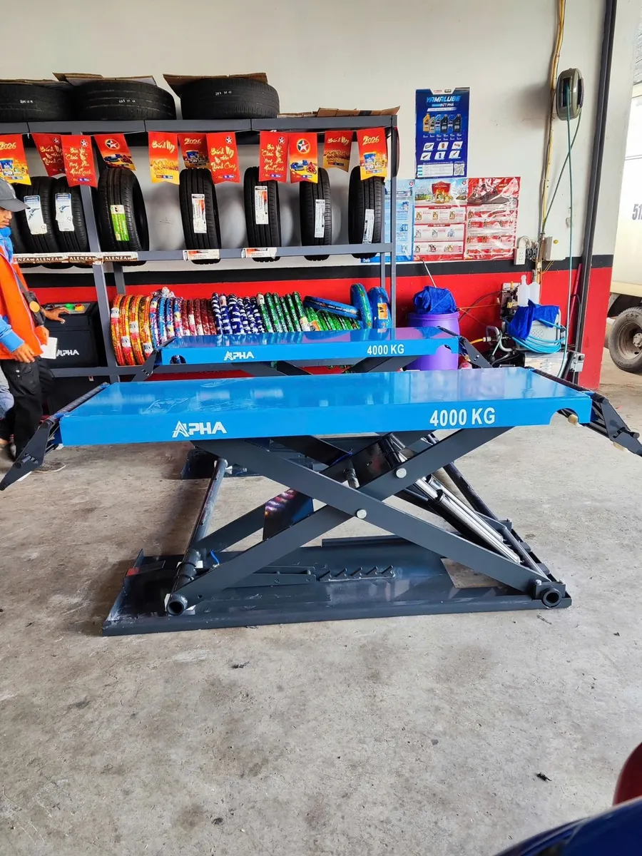 Cầu nâng cắt kéo di động Alpha AL-4XD chính hãng Lộc Phát tại tiệm làm lốp