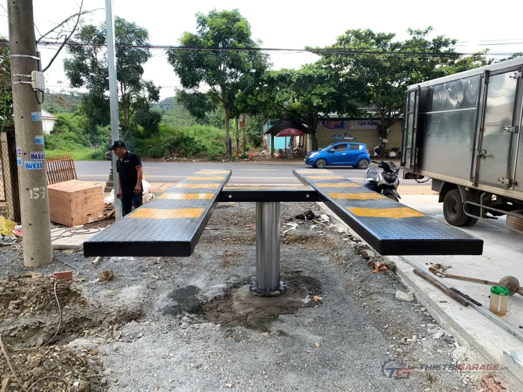 Cầu nâng 1 trụ rửa xe ô tô lắp âm nền phẳng sàn tại trạm dịch vụ chăm sóc xe