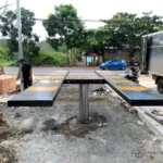 Cầu nâng 1 trụ rửa xe ô tô lắp âm nền phẳng sàn tại trạm dịch vụ chăm sóc xe