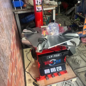 máy tháo vỏ suntek lp-900 trực diện khung thép sơn tĩnh điện xanh