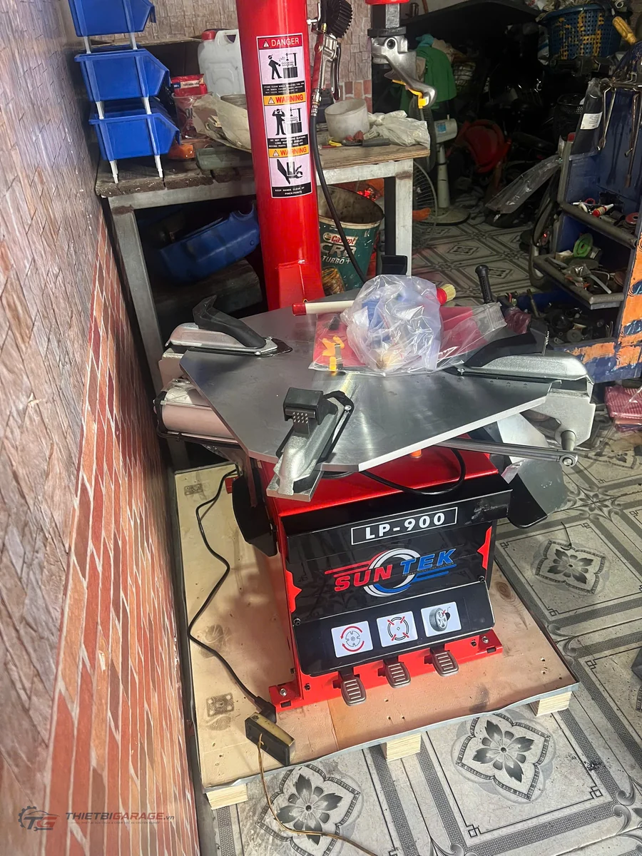 máy tháo vỏ suntek lp-900 trực diện khung thép sơn tĩnh điện xanh